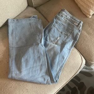 Distressed light wash bell bottoms